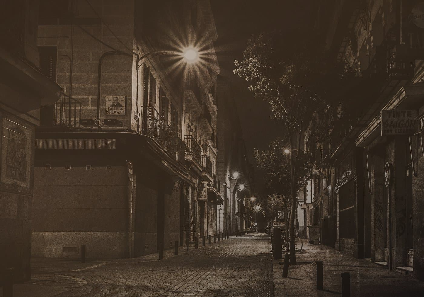 Warm night street with reflective pavement